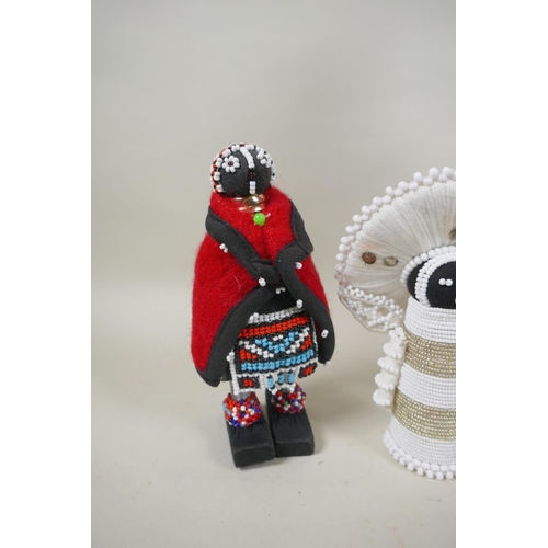 92 - Four South African Ndebele beadwork dolls, largest 37cm high