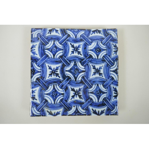 93 - A Chinese blue and white porcelain temple tile with repeating pattern,  20 x 20cm