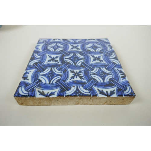 93 - A Chinese blue and white porcelain temple tile with repeating pattern,  20 x 20cm