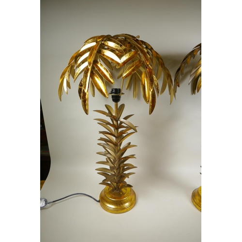 97 - A pair of gilt metal table lamps in the form of palm trees, 72cm high