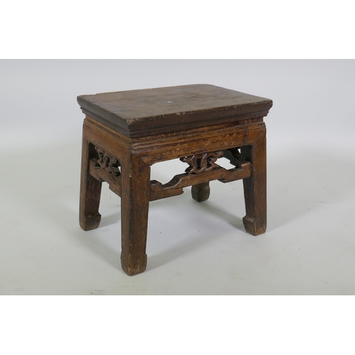 1106 - An early Chinese elm stool with carved frieze, 39 x 28cm, 35cm high