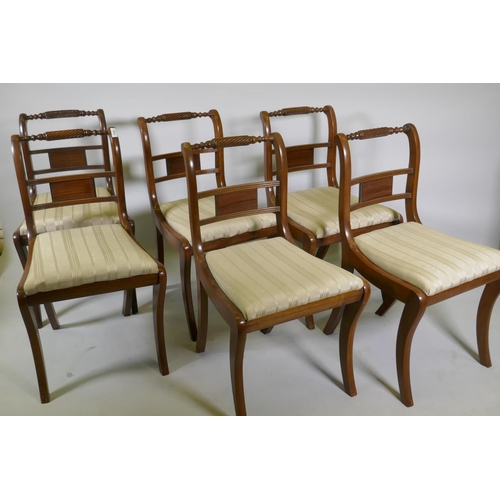 1174 - A set of six Regency style mahogany dining chairs with rope twist backs