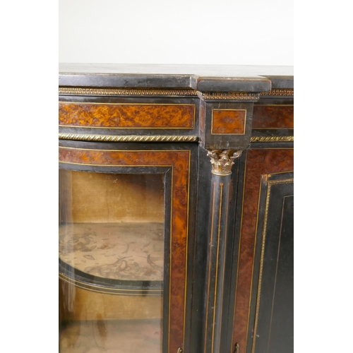 1234 - A Victorian Aesthetic ebony and amboyna inlaid credenza with brass mounts, the inverted breakfront t... 