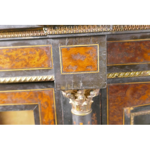 1234 - A Victorian Aesthetic ebony and amboyna inlaid credenza with brass mounts, the inverted breakfront t... 