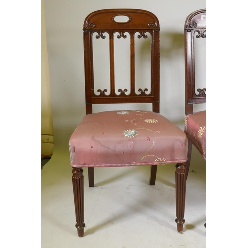 1247 - A set of four early C20th Continental mahogany dining chairs with carved slat backs