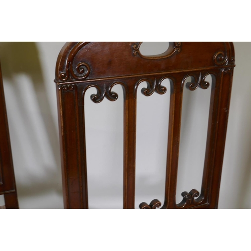 1247 - A set of four early C20th Continental mahogany dining chairs with carved slat backs