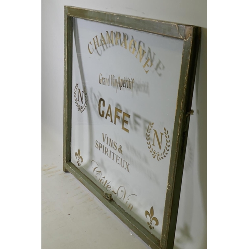 1007 - A painted pine window frame with later decorative painted signwork, 98 x 94cm