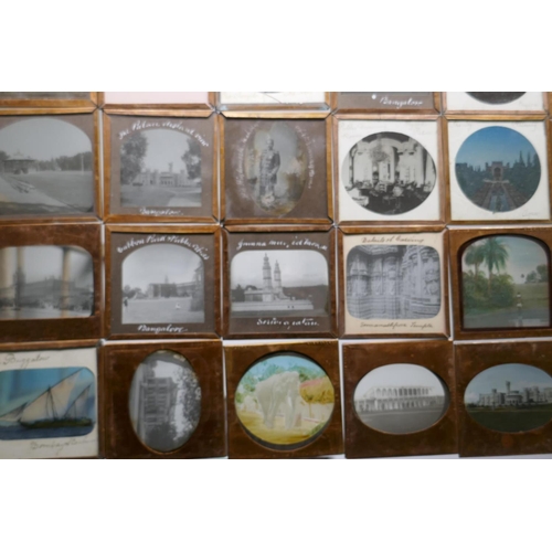 101 - Collection of magic lantern slides in copper frames by J. Moore of Birmingham, views of India, Banga... 