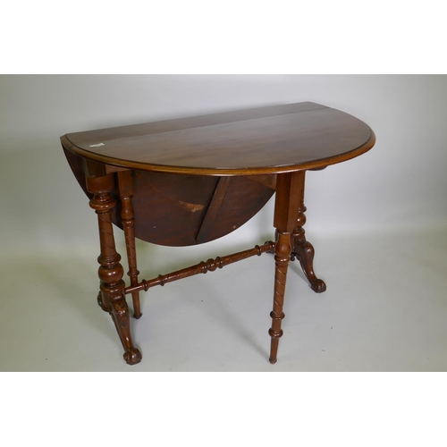 1014 - A Victorian mahogany Sutherland table, raised on turned end columns with scroll supports, 97 x 16 x ... 