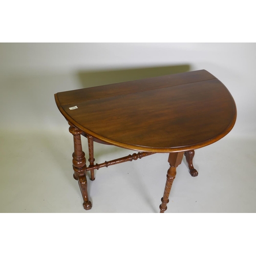 1014 - A Victorian mahogany Sutherland table, raised on turned end columns with scroll supports, 97 x 16 x ... 