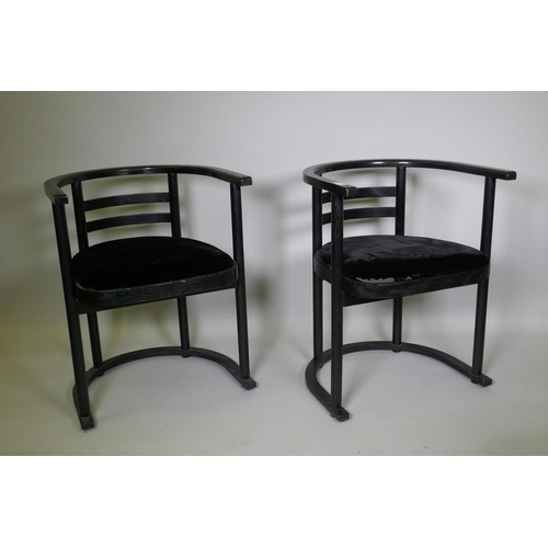 1015 - A pair of Danish black ash tub chairs