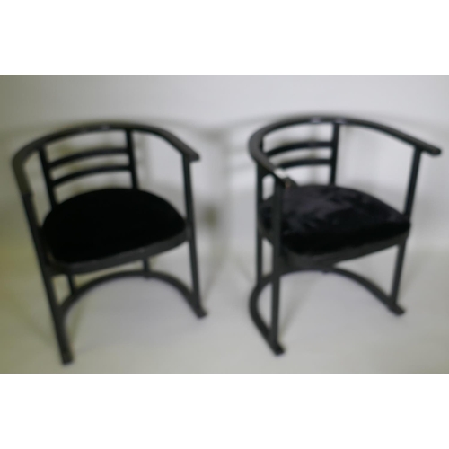 1015 - A pair of Danish black ash tub chairs