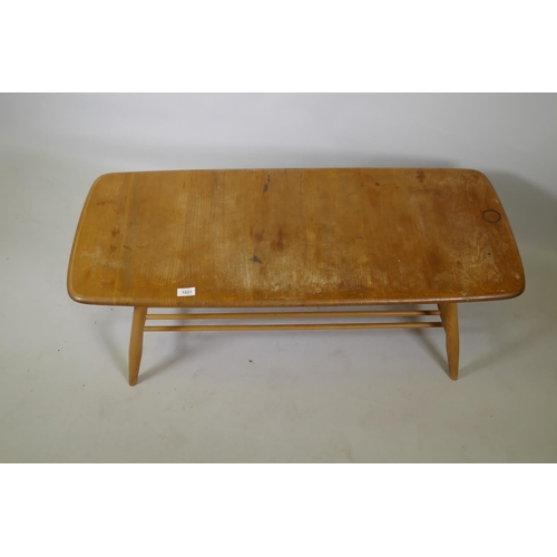 1021 - A mid C20th Ercol elm and beech coffee table, Model 459, 105 x 46cm, 37cm high