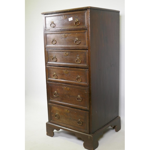 1022 - A C19th oak chest of six drawers with moulded fronts and drop handles, raised on bracket supports, 5... 