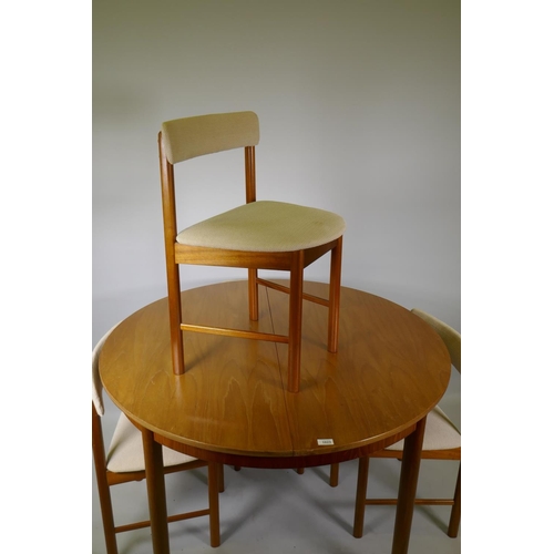 1023 - A McIntosh of Kirkcaldy Roundette teak extending dining table and four chairs ensuite, 114cm diamete... 