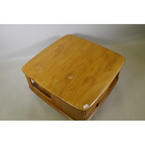 1024 - A mid C20th Ercol elm Pandora's box occasional table, Model 735, 80 x 80cm, 38cm high