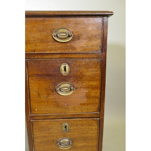 1028 - A Georgian mahogany kneehole desk, the seven drawers with cock beaded detail and original brass plat... 