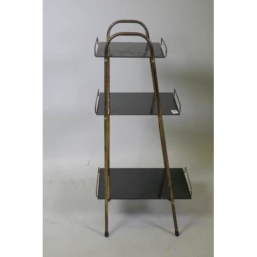 1030 - A three tier metal open shelf with glass shelves, 80 x 30 x 38cm