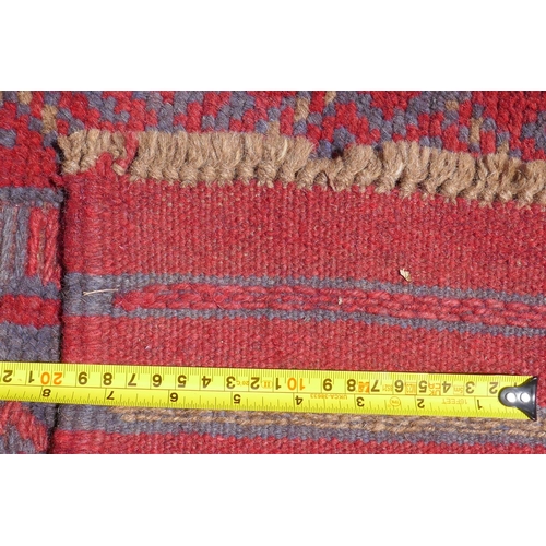 1031 - A red and blue ground hand woven Afghan Meshkin tribal runner, 60 x 240cm