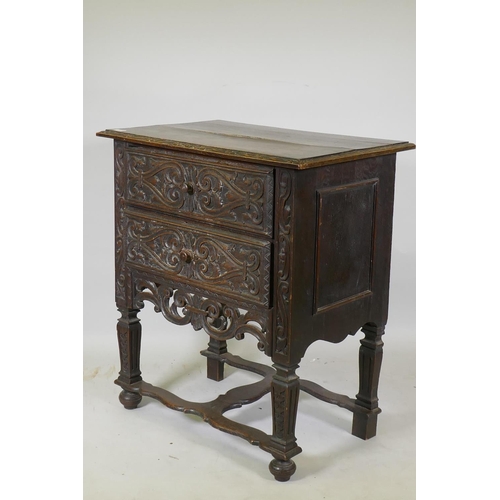 1042 - C19th Continental oak two drawer chest with carved front and pierced apron, raised on shaped support... 