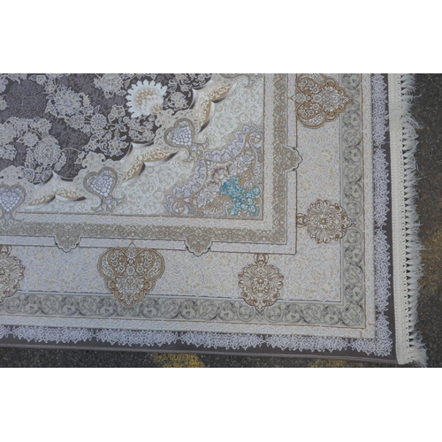 1045 - A fine woven white and pewter ground Iranian carpet embossed with a floral medallion design, 3 x 2m