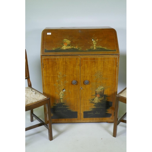 1052 - An Art Deco 'Turnidge' walnut bureau with raised chinoiserie decoration, the fall front with fitted ... 