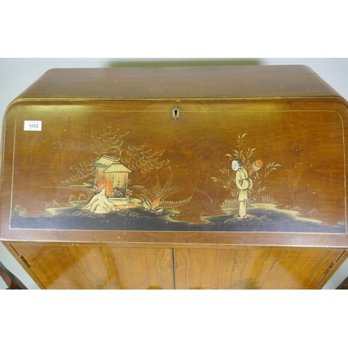 1052 - An Art Deco 'Turnidge' walnut bureau with raised chinoiserie decoration, the fall front with fitted ... 