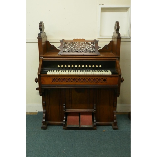 1056 - An Alphonse Cary of Newbury walnut cased organ, with carved and pierced fret decoration, 133 x 62 x ... 