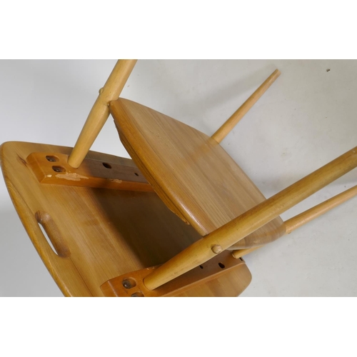 1062 - A mid C20th Ercol elm and beech Windsor tray table with undertier, Model No. 457, 72 x 75 x 45cm