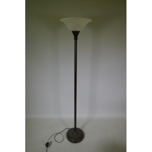 1063 - A fluted metal standard lamp with clouded glass shade, 166cm high