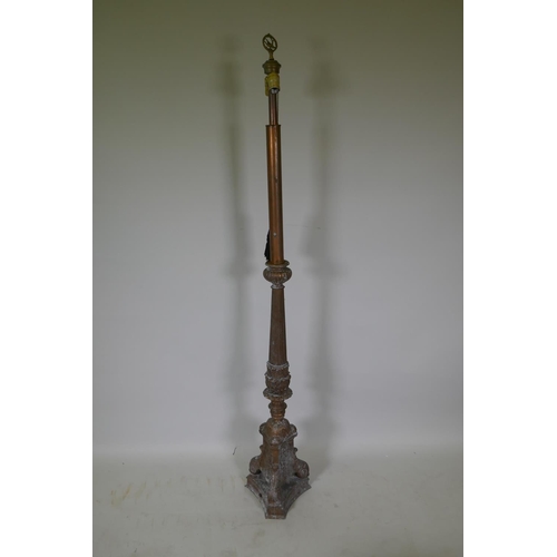 1067 - A coppered metal church torchere style standard lamp, 160cm high