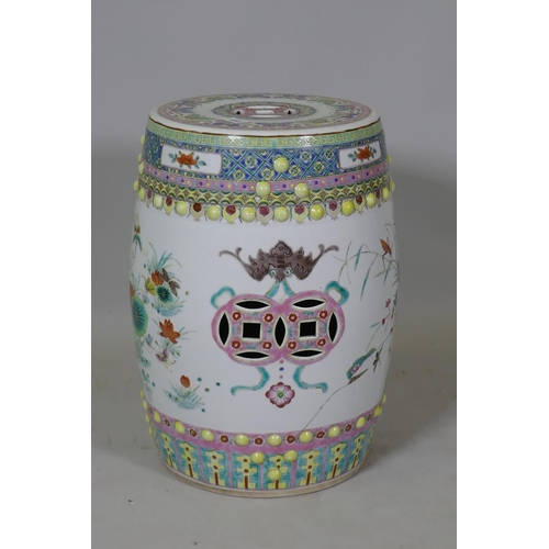 1069 - A Chinese ceramic garden stool in the form of a barrel, with famille verte enamel decoration, 49cm h... 