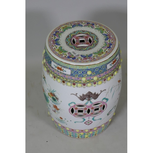 1069 - A Chinese ceramic garden stool in the form of a barrel, with famille verte enamel decoration, 49cm h... 