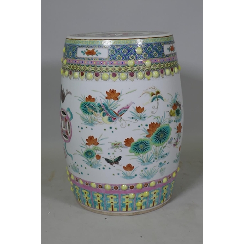 1069 - A Chinese ceramic garden stool in the form of a barrel, with famille verte enamel decoration, 49cm h... 