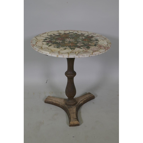 1078 - A marble mosaic topped coffee table decorated with a unique floral design, 51cm high, 50cm diameter