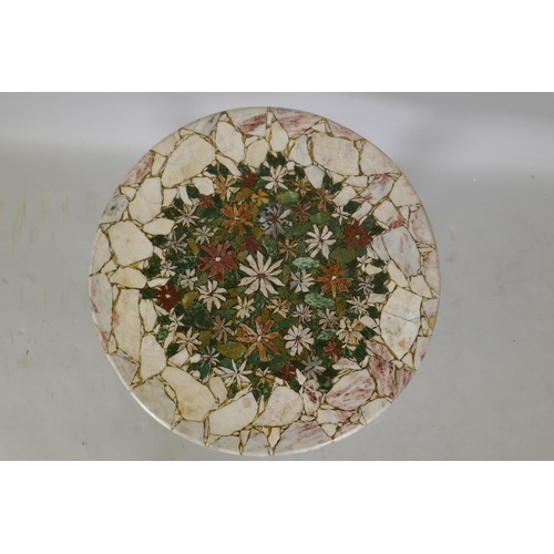 1078 - A marble mosaic topped coffee table decorated with a unique floral design, 51cm high, 50cm diameter