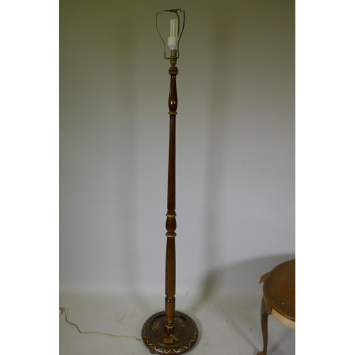 1080 - An Art Deco beechwood standard lamp by Turnidge, with raised chinoiserie decoration, 175cm high, and... 