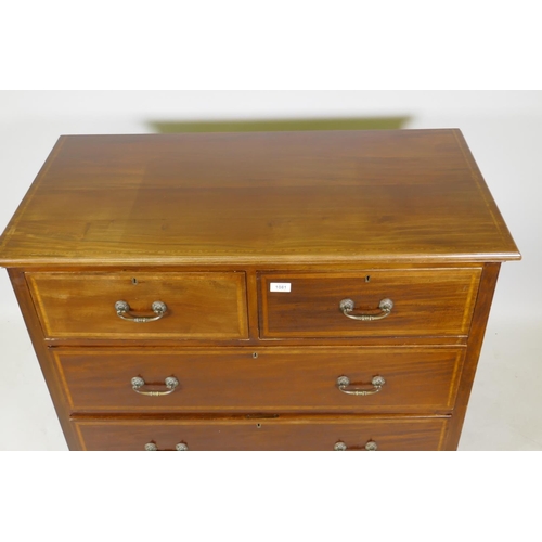 1081 - A mahogany chest of two over two drawers, with inlaid satinwood banding fitted with brass handles an... 