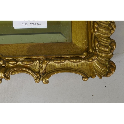 1087 - A giltwood and composition wall mirror with bevelled glass, late C19th/early C20th, 39 x 46cm