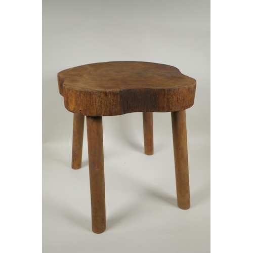 1088 - A rustic wooden stool, 37cm high