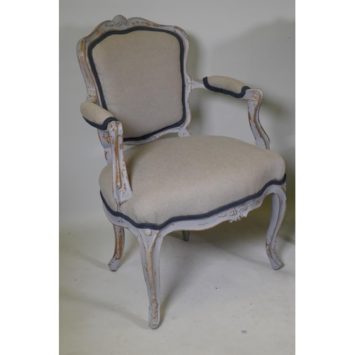 1091 - A pair of C19th French painted beechwood arm chairs with shaped backs and carved decoration, raised ... 