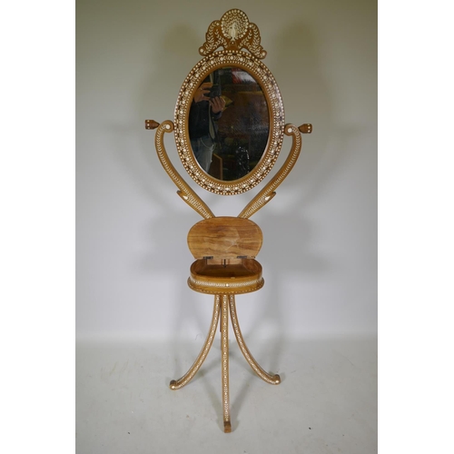 1094 - An Anglo Indian bone and ebony inlaid dressing table, 152cm high