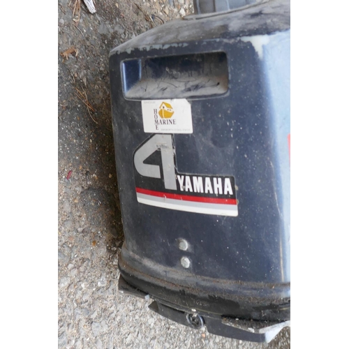 1098 - An Evinrude Junior outboard motor, and a Yamaha outboard, lacks propeller and lower leg