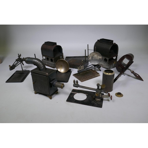 110 - Magic lantern slides, various in wood frames, kaleidoscope glasses and lantern reflectors, lights et... 