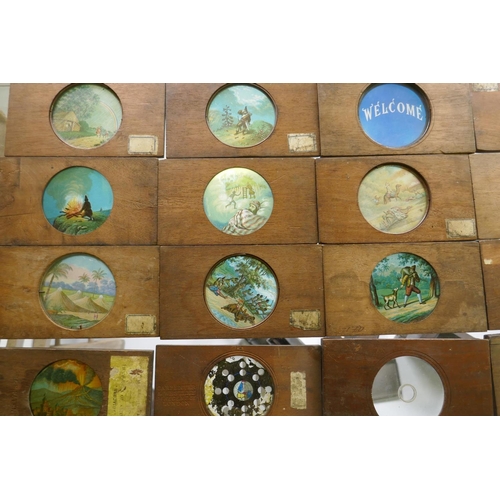 110 - Magic lantern slides, various in wood frames, kaleidoscope glasses and lantern reflectors, lights et... 