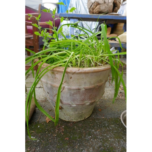 1102 - A Victorian terracotta chimney pot, and a terracotta planter, pot 92cm high