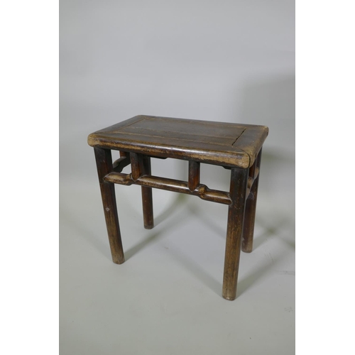 1113 - A Chinese hardwood occasional table with a single drawer and lattice undertier, together with a smal... 