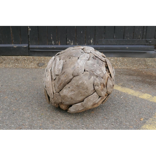 1117 - A driftwood ball garden sculpture, 44cm diameter