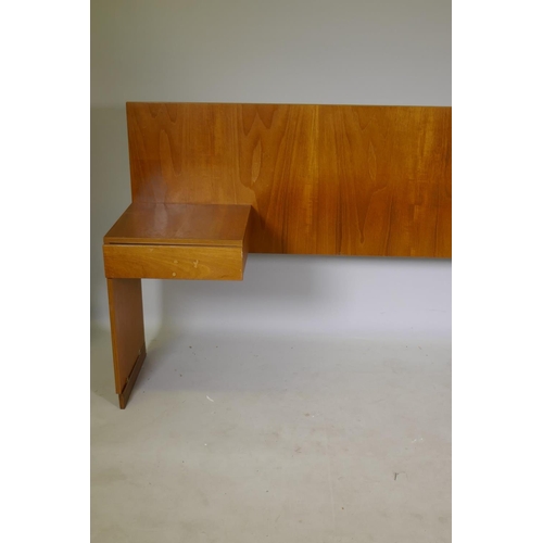 1119 - A mid century teak veneered bed-head with drawer to each side, 229cm, 147cm between the drawers, 91c... 