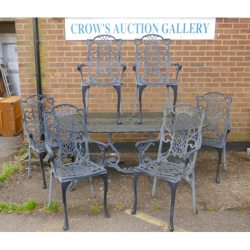 1120 - A painted metal garden table and six chairs ensuite, 187 x 95cm